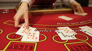 Live blackjack table with dealer and multiple camera angles Live blackjack table with dealer and multiple camera angles
